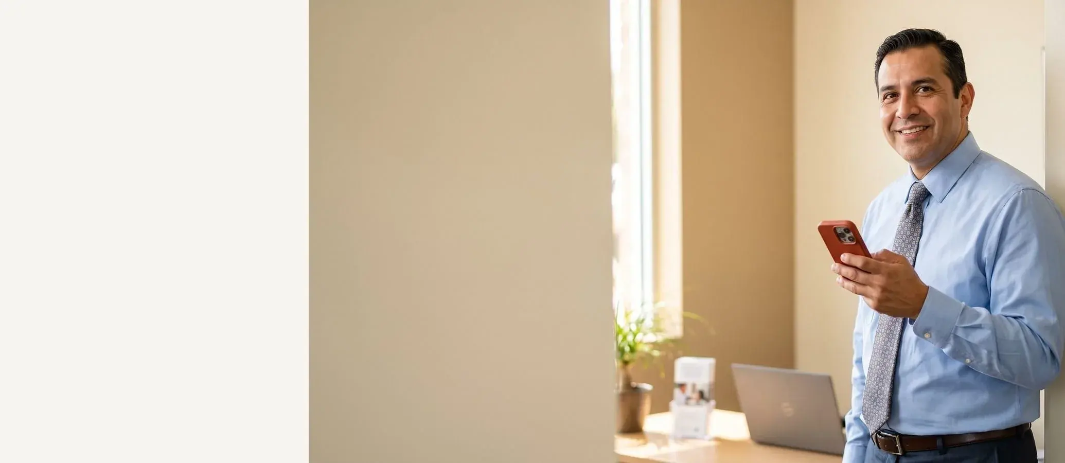Insurance professional inside his office